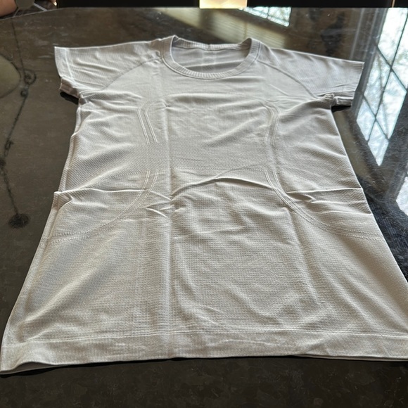 Tops - Lululemon, short sleeve top , gray color , size 8 , good condition